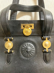 Vintage Gianni Versace black caviar type leather birkin doctor's bag, handbag with jewelry case and golden sun burst motifs. 070325ys