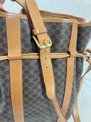 Vintage Celine hobo bucket shoulder bag in classic brown triomphe pattern with leather straps. 070218ys8