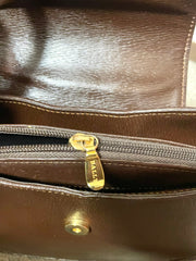 Vintage Bally brown leather trapezoid design shoulder bag with gold tone logo. Unisex use. 061003y2