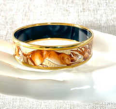 Vintage HERMES gold and brown tone and cloisonné/enamel bangle with rabbit, dog, and fox design. 070310ac2