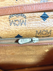 1990s. Vintage MCM brown monogram shoulder bag in envelop design. Designed by Michael Cromer. Can be a clutch bag too. 061217ac2
