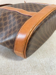 Vintage Celine hobo bucket shoulder bag in classic brown triomphe pattern with leather straps. 070218ys8