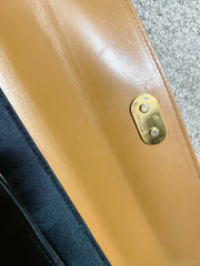 Vintage Yves Saint Laurent black and brown leather handbag with embossed “YSL” logo all over. One of the best daily use purses. 060611ac4
