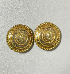 Vintage Yves Saint Laurent golden round logo earring with engraved signature. 0410132