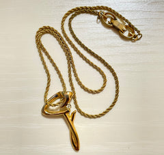Vintage Givenchy golden chain necklace with g letter and crystal top. Classic jewelry that fits any occasion. 061127m1