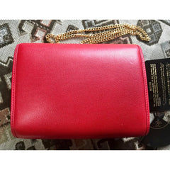 Vintage Karl Lagerfeld mini red clutch shoulder bag with round logo motif. Rare and beautiful purse. 050406r9