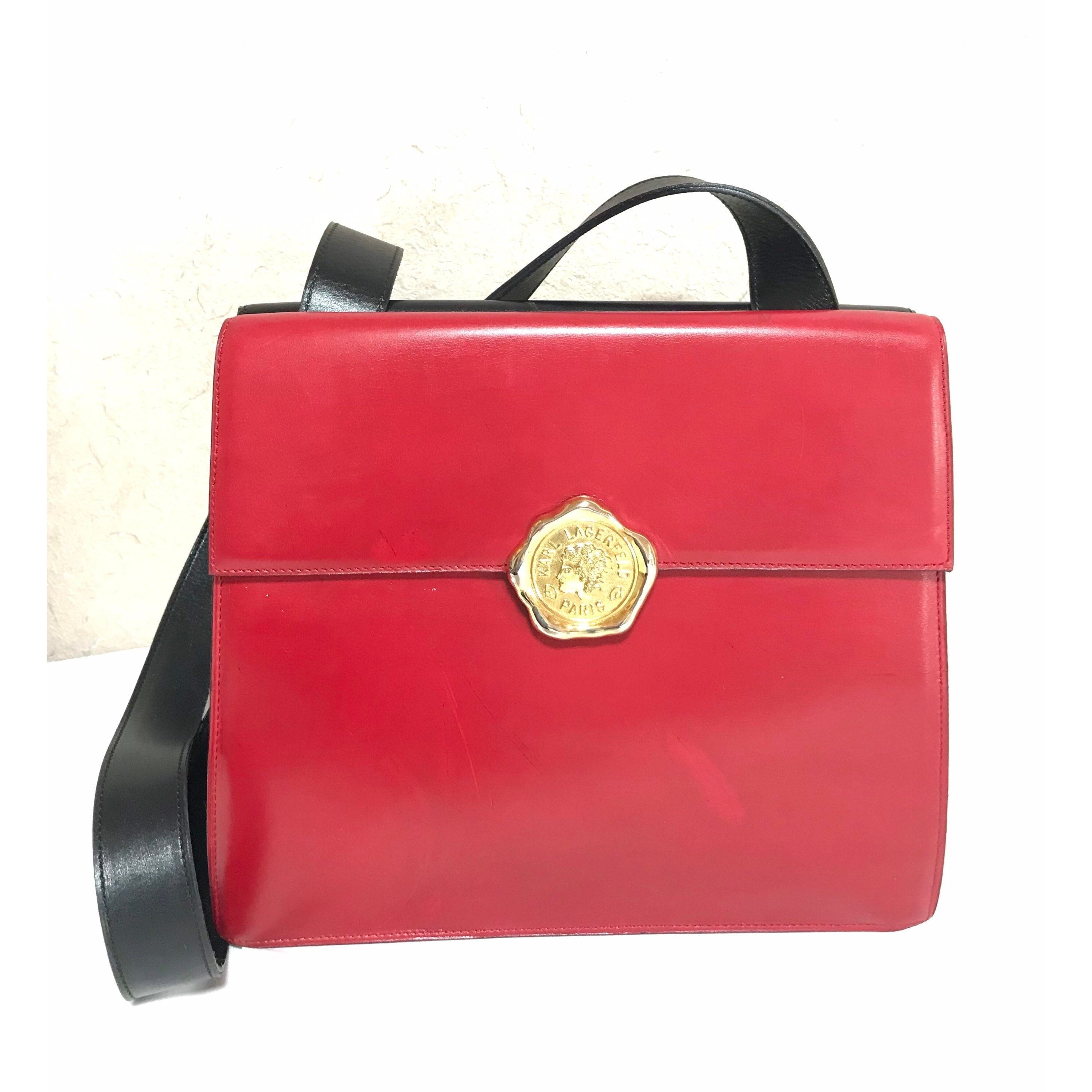 Vintage Karl Lagerfeld red and black double face shoulder bag with golden logo motifs. Rare unique bag. Must have. 060605r1