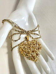 Vintage Yves Saint Laurent golden chain long statement necklace with arabesque heart and crystal pendant top. 050803y3