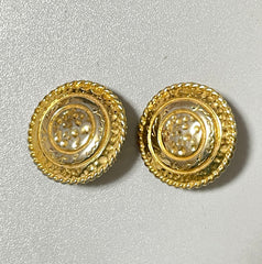 Vintage Yves Saint Laurent golden round logo earring with engraved signature. 0410132