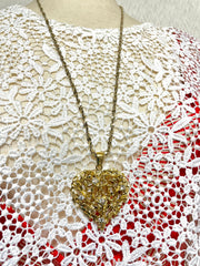 Vintage Yves Saint Laurent golden chain long statement necklace with arabesque heart and crystal pendant top. 050803y3