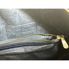MINT. Vintage MCM navy and white monogram round shape Suzy Wong shoulder bag with leather trimmings. Designed by Michael Cromer. 060309ya
