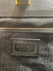 Vintage Gianni Versace black caviar type leather birkin doctor's bag, handbag with jewelry case and golden sun burst motifs. 070325ys