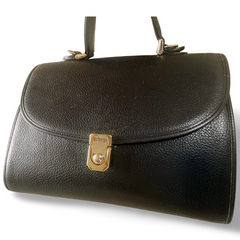Vintage Burberry genuine black leather handbag with silver metal closure and Nova check linings. 070218ys4