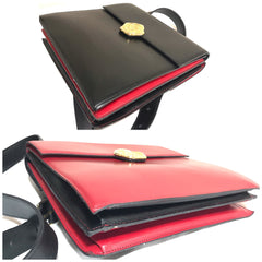 Vintage Karl Lagerfeld red and black double face shoulder bag with golden logo motifs. Rare unique bag. Must have. 060605r1