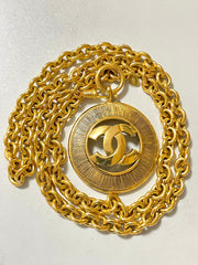Vintage CHANEL golden necklace with a large cutout round CC mark pendant top. Classic and simple jewelry. Beautiful jewelry piece. 050816ys1