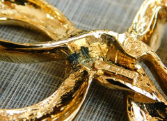 Vintage Nina Ricci golden bow brooch. Must have vintage jewelry piece back in the old era. 0406101