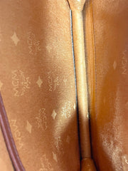 1990s. Vintage MCM brown monogram shoulder bag in envelop design. Designed by Michael Cromer. Can be a clutch bag too. 061217ac2
