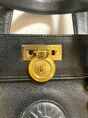 Vintage Gianni Versace black caviar type leather birkin doctor's bag, handbag with jewelry case and golden sun burst motifs. 070325ys