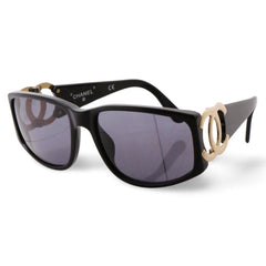 Vintage CHANEL black frame sunglasses with large CC motifs at sides. Mod and chic eyewear you must get. 060521ac4