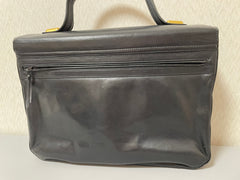 Vintage Bally black leather retro pop design bag, business purse with gold tone drawstrings and unique flap cut design. Unisex use. 160315