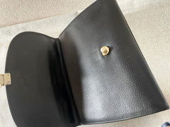 Vintage Burberry genuine black leather handbag with silver metal closure and Nova check linings. 070218ys4