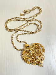 Vintage Yves Saint Laurent golden chain long statement necklace with arabesque heart and crystal pendant top. 050803y3