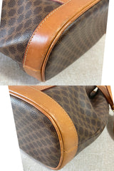 Vintage Celine hobo bucket shoulder bag in classic brown triomphe pattern with leather straps. 070218ys8