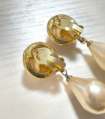 Vintage CHANEL teardrop white faux pearl earrings with golden CC mark on top. Chanel earrings that dangle as you move. 060903ac1