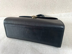 Vintage Burberry genuine black leather handbag with silver metal closure and Nova check linings. 070218ys4