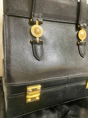 Vintage Gianni Versace black caviar type leather birkin doctor's bag, handbag with jewelry case and golden sun burst motifs. 070325ys