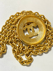 Vintage CHANEL golden necklace with a large cutout round CC mark pendant top. Classic and simple jewelry. Beautiful jewelry piece. 050816ys1