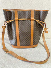 Vintage Celine hobo bucket shoulder bag in classic brown triomphe pattern with leather straps. 070218ys8