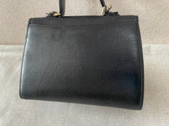 Vintage Burberry genuine black leather handbag with silver metal closure and Nova check linings. 070218ys4