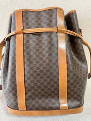 Vintage Celine hobo bucket shoulder bag in classic brown triomphe pattern with leather straps. 070218ys8
