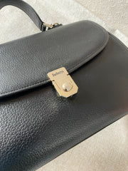 Vintage Burberry genuine black leather handbag with silver metal closure and Nova check linings. 070218ys4