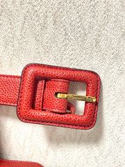 Vintage CHANEL red caviar leather waist bag, fanny pack purse with a matching leather belt and logo charm pull. 26” thru 28”. 070819ac2