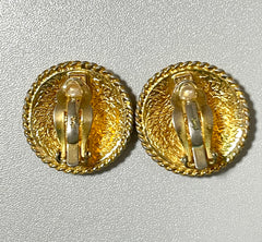 Vintage Yves Saint Laurent golden round logo earring with engraved signature. 0410132