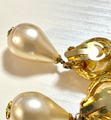 Vintage CHANEL teardrop white faux pearl earrings with golden CC mark on top. Chanel earrings that dangle as you move. 060903ac1