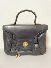 Vintage Bally black leather retro pop design bag, business purse with gold tone drawstrings and unique flap cut design. Unisex use. 160315