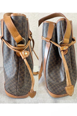 Vintage Celine hobo bucket shoulder bag in classic brown triomphe pattern with leather straps. 070218ys8