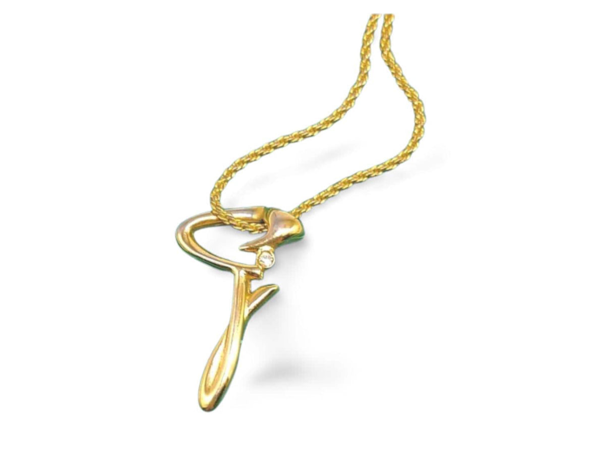 Vintage Givenchy golden chain necklace with g letter and crystal top. Classic jewelry that fits any occasion. 061127m1