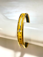 Vintage Hermes yellow cloisonne enamel bangle with star, cloud, and arabesque design. Classic bracelet. 070128ac4
