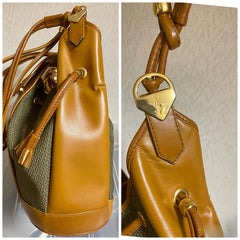 Vintage Yves Saint Laurent hobo bucket shoulder bag with camel brown leather trimmings and golden logo plate. YSL classic purse. 060823ac