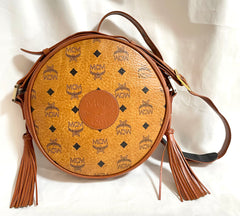 Vintage MCM brown monogram round Suzy Wong shoulder bag with brown leather trimmings. Designed by Michael Cromer. Unisex. 050524ra1