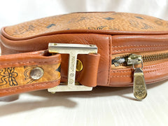 Vintage MCM brown monogram round Suzy Wong shoulder bag with brown leather trimmings. Designed by Michael Cromer. Unisex. 050524ra1