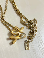 W3. Vintage Yves Saint Laurent golden YSL logo and heart crystal necklace. Must have jewelry piece. 050611ya