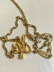 W3. Vintage Yves Saint Laurent golden YSL logo and heart crystal necklace. Must have jewelry piece. 050611ya