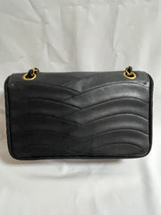 80's vintage Chanel black 2.55 shoulder bag with wavy stitches and rope strings and gold chain strap. Very rare piece from the era. 050730ra