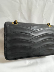 80's vintage Chanel black 2.55 shoulder bag with wavy stitches and rope strings and gold chain strap. Very rare piece from the era. 050730ra