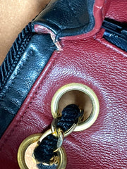 80's vintage Chanel black 2.55 shoulder bag with wavy stitches and rope strings and gold chain strap. Very rare piece from the era. 050730ra